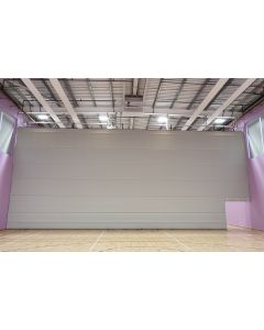 Vertically retractable acoustic divider curtain with an integral door opening