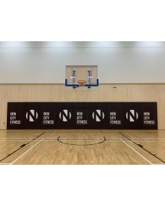 Basketball court end wall impact panelling