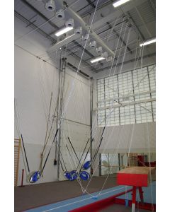 Travelling spotting rig with agility and twisting belts shown on a tumble track