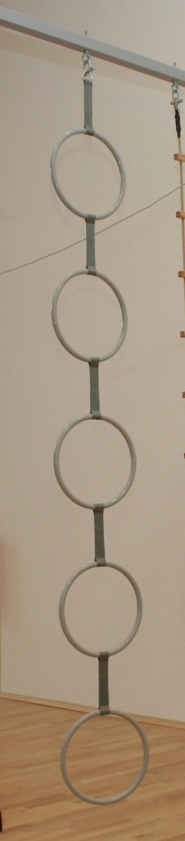 Linked rings for wall hinged rope frames