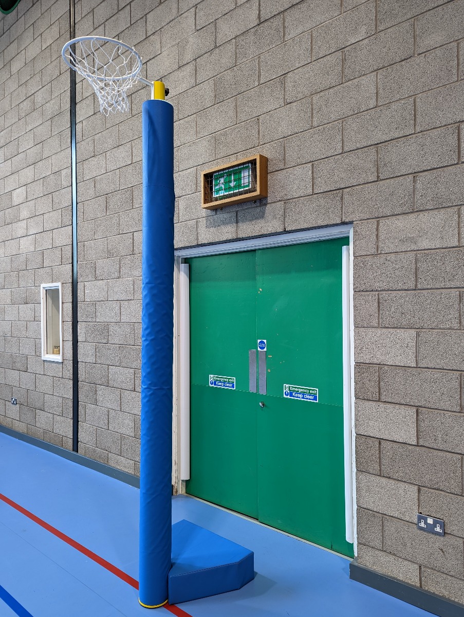 Netball posts - competition - floor anchored - base padding